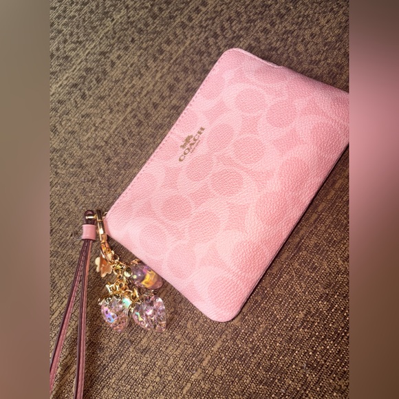 Coach Handbags - Coach powder Pink Leather Wristlet